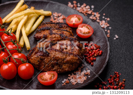 Meat, juicy beef steak grilled cooked to perfection for lunch. Barbecued steak 131209113