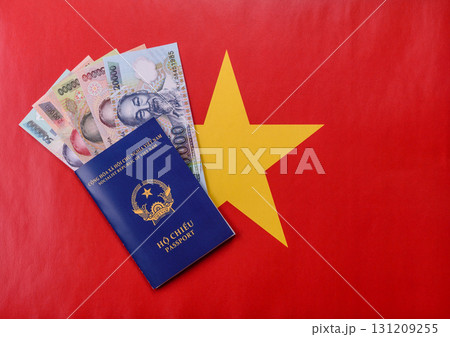 Vietnam passport for travelling, flying and doing business. Vietnamese document Vietnam passport for travelling, flying and doing business. Vietnamese document 131209255
