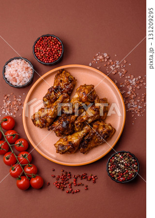 Grilled or barbecued chicken wings with teriyaki sauce, spices and sesame seeds. Teriyaki chicken 131209295