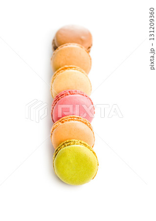 Different flavors of macarons. Colourful macaroons isolated on white background. 131209360