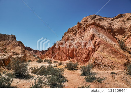 Fairy Tale Canyon, Kyrgyzstan travel destination, tourist location. Fairy Tale Canyon, Kyrgyzstan travel destination, tourist location. 131209444
