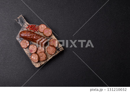 Homemade meat or vegan sausage grilled with spices. Homemade sausage cooked on barbecue Homemade meat or vegan sausage grilled with spices. Homemade sausage cooked on barbecue 131210032