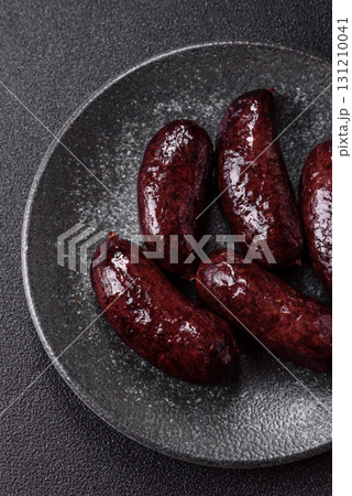 Blood sausage, pudding, meat food with lard and spices. Blood sausage Blood sausage, pudding, meat food with lard and spices. Blood sausage 131210041
