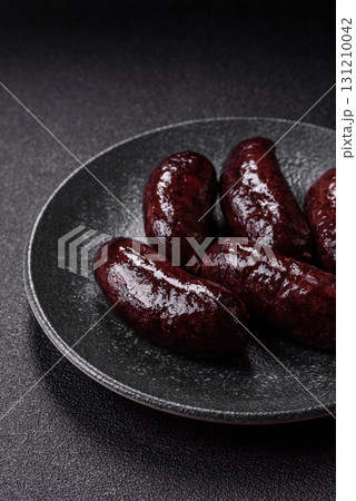 Blood sausage, pudding, meat food with lard and spices. Blood sausage Blood sausage, pudding, meat food with lard and spices. Blood sausage 131210042