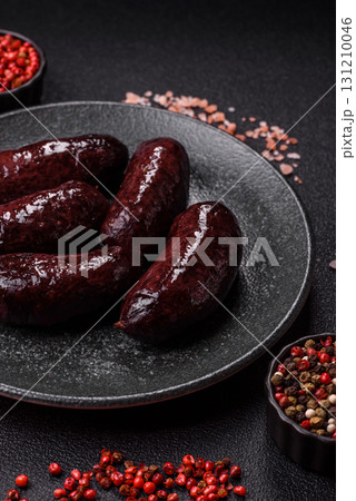 Blood sausage, pudding, meat food with lard and spices. Blood sausage Blood sausage, pudding, meat food with lard and spices. Blood sausage 131210046