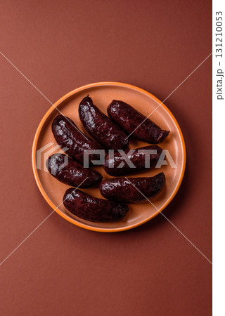 Blood sausage, pudding, meat food with lard and spices. Blood sausage 131210053