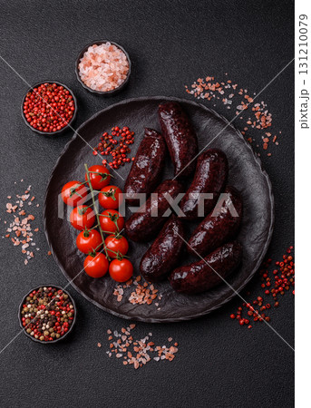 Blood sausage, pudding, meat food with lard and spices. Blood sausage Blood sausage, pudding, meat food with lard and spices. Blood sausage 131210079