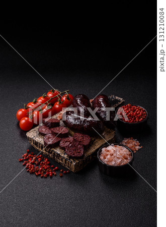 Blood sausage, pudding, meat food with lard and spices. Blood sausage Blood sausage, pudding, meat food with lard and spices. Blood sausage 131210084
