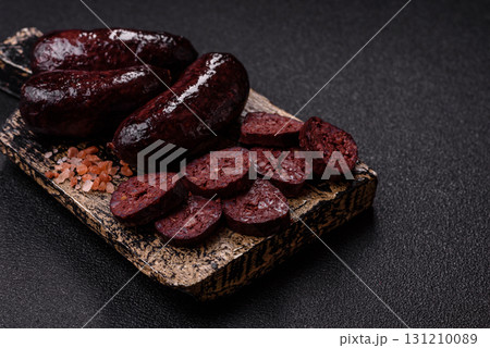 Blood sausage, pudding, meat food with lard and spices. Blood sausage Blood sausage, pudding, meat food with lard and spices. Blood sausage 131210089