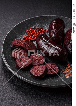 Blood sausage, pudding, meat food with lard and spices. Blood sausage Blood sausage, pudding, meat food with lard and spices. Blood sausage 131210104