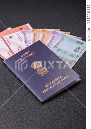 Indian passport and tickets for travelling, flying and doing business. India document, id 131210111