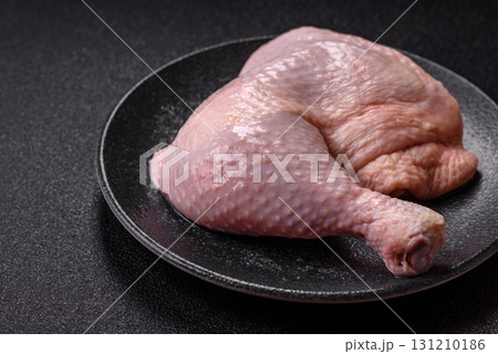 Chicken raw leg or quarter, fresh meat for cooking on barbecue. Chicken quarter 131210186