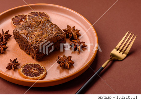 Chocolate brownie cake, food, sweet dessert with nuts rectangular shape. Sweet chocolate brownie Chocolate brownie cake, food, sweet dessert with nuts rectangular shape. Sweet chocolate brownie 131210311