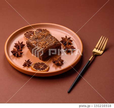 Chocolate brownie cake, food, sweet dessert with nuts rectangular shape. Sweet chocolate brownie 131210318