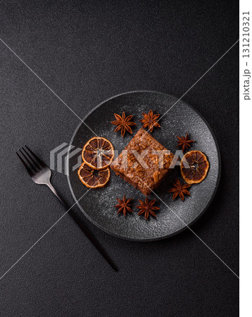 Chocolate brownie cake, food, sweet dessert with nuts rectangular shape. Sweet chocolate brownie Chocolate brownie cake, food, sweet dessert with nuts rectangular shape. Sweet chocolate brownie 131210321