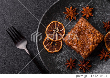 Chocolate brownie cake, food, sweet dessert with nuts rectangular shape. Sweet chocolate brownie 131210324