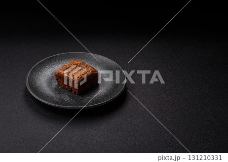 Chocolate brownie cake, food, sweet dessert with nuts rectangular shape. Sweet chocolate brownie 131210331