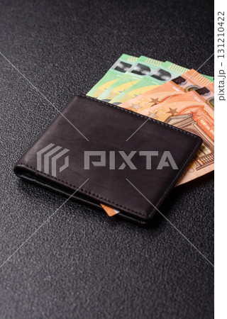 Paper money, euro notes, cash for savings and investments. Euro paper cash Paper money, euro notes, cash for savings and investments. Euro paper cash 131210422