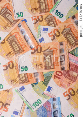 Paper money, euro notes, cash for savings and investments. Euro paper cash Paper money, euro notes, cash for savings and investments. Euro paper cash 131210463