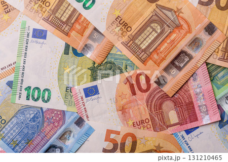 Paper money, euro notes, cash for savings and investments. Euro paper cash Paper money, euro notes, cash for savings and investments. Euro paper cash 131210465