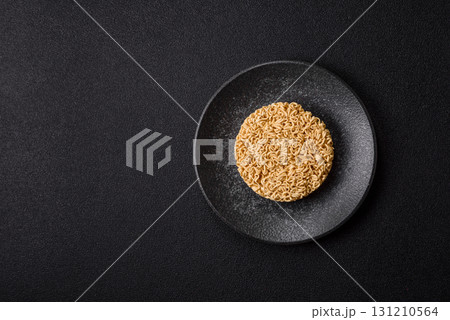 Instant noodles or ramen, Asian food, pasta with vegetables. Noodles, takeaway food Instant noodles or ramen, Asian food, pasta with vegetables. Noodles, takeaway food 131210564