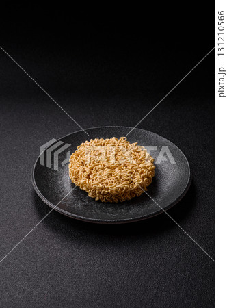 Instant noodles or ramen, Asian food, pasta with vegetables. Noodles, takeaway food Instant noodles or ramen, Asian food, pasta with vegetables. Noodles, takeaway food 131210566