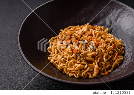 Instant noodles or ramen, Asian food, pasta with vegetables. Noodles, takeaway food 131210581