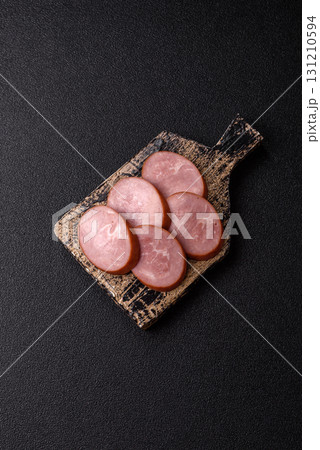 Sliced ham, meat, pork or turkey sausage for sandwiches. Ham slices, food Sliced ham, meat, pork or turkey sausage for sandwiches. Ham slices, food 131210594