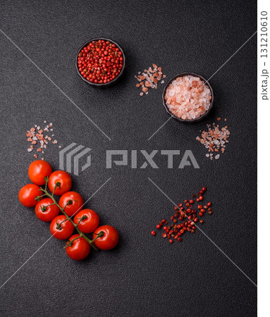 Ingredients for cooking cherry tomatoes, salt, spices and herbs Ingredients for cooking cherry tomatoes, salt, spices and herbs 131210610