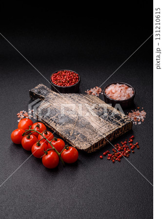 Ingredients for cooking cherry tomatoes, salt, spices and herbs Ingredients for cooking cherry tomatoes, salt, spices and herbs 131210615