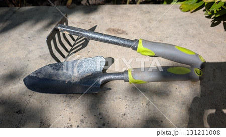 Essential Gardening Tools Trowel and Rake for Efficient Soil Cultivation and Maintenance Essential Gardening Tools Trowel and Rake for Efficient Soil Cultivation and Maintenance 131211008