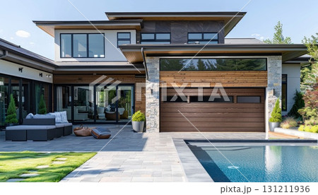 Spacious property with pool, house, and tree in front 131211936