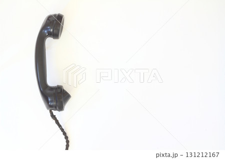 black old telephone receiver hanging on white background with texting space, waiting for phone call black old telephone receiver hanging on white background with texting space, waiting for phone call 131212167