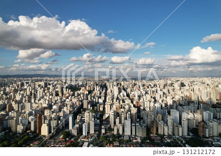 Expansive view of Sao Paulo skyline showcasing modern architecture and clouds 131212172