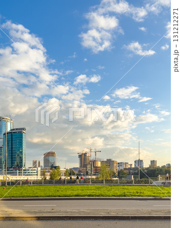 A cityscape with modern buildings and blue skies. A cityscape with modern buildings and blue skies. 131212271