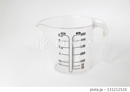 measuring cup isolated on white background. measuring cup isolated on white background. 131212528