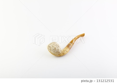 Smoking pipe wooden souvenir isolated white background Smoking pipe wooden souvenir isolated white background 131212531