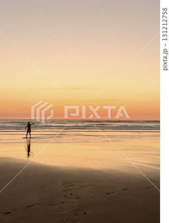 Children enjoying sunset by the beach in Biscarosse 131212758