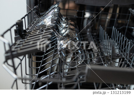 Open dishwasher with clean glassware inside Open dishwasher with clean glassware inside 131213199