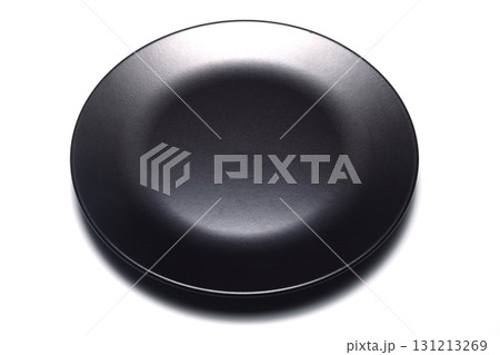 Empty black slate plate on white background. Food background for menu, recipe. Table setting. Flatlay, top view Empty black slate plate on white background. Food background for menu, recipe. Table setting. Flatlay, top view 131213269