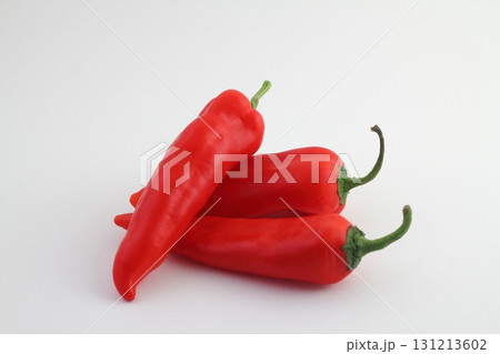 Red bell pepper closeup photo on white background. Fresh vegetable isolated. Fresh ripe bell pepper. Red bell pepper closeup photo on white background. Fresh vegetable isolated. Fresh ripe bell pepper. 131213602