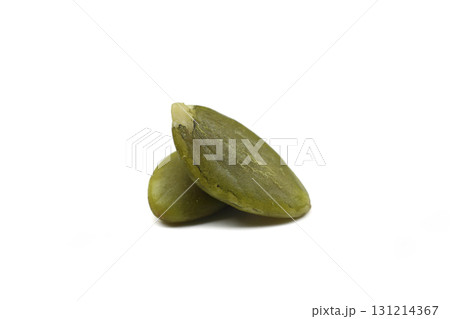 Top view of two hulled kernels of pumpkin seeds. Macro pumpkin seeds 131214367