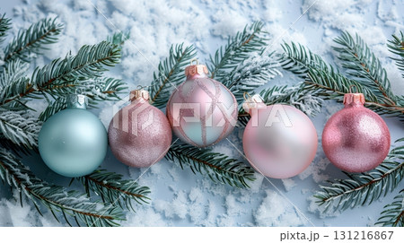Elegant Christmas Ornaments on Snowy Evergreen Background 131216867