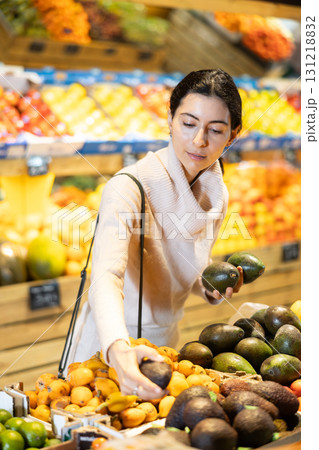Armenian woman chooses avocado Armenian woman chooses avocado 131218832
