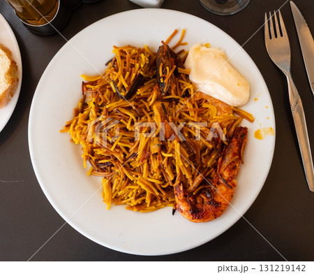 Fideua with seafood served on platter Fideua with seafood served on platter 131219142