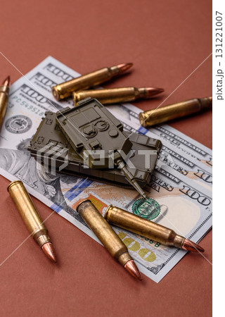 Money, cash dollars to fund weapons for war and defense against attack. Dollars for war 131221007