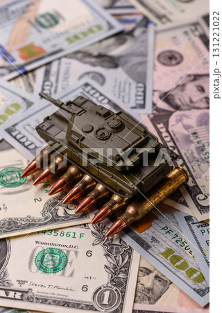 Money, cash dollars to fund weapons for war and defense against attack. Dollars for war Money, cash dollars to fund weapons for war and defense against attack. Dollars for war 131221022