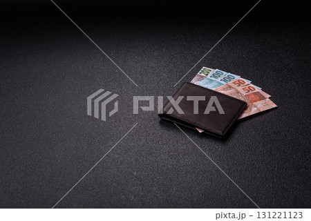 Cash paper money of Brazil, notes as a conceptual background of investment, savings Cash paper money of Brazil, notes as a conceptual background of investment, savings 131221123