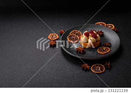 Sweet cake or tart round with cream and raspberries. Raspberry sweet tart 131221139