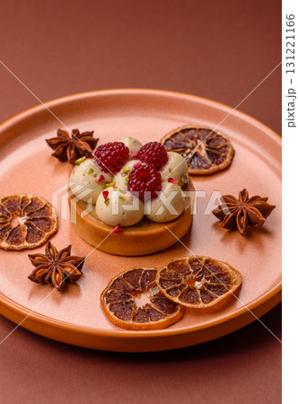 Sweet cake or tart round with cream and raspberries. Raspberry sweet tart 131221166